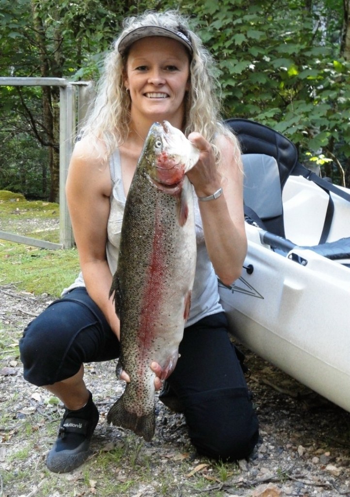 Sheree with her rainbow trout © Carl Hyland